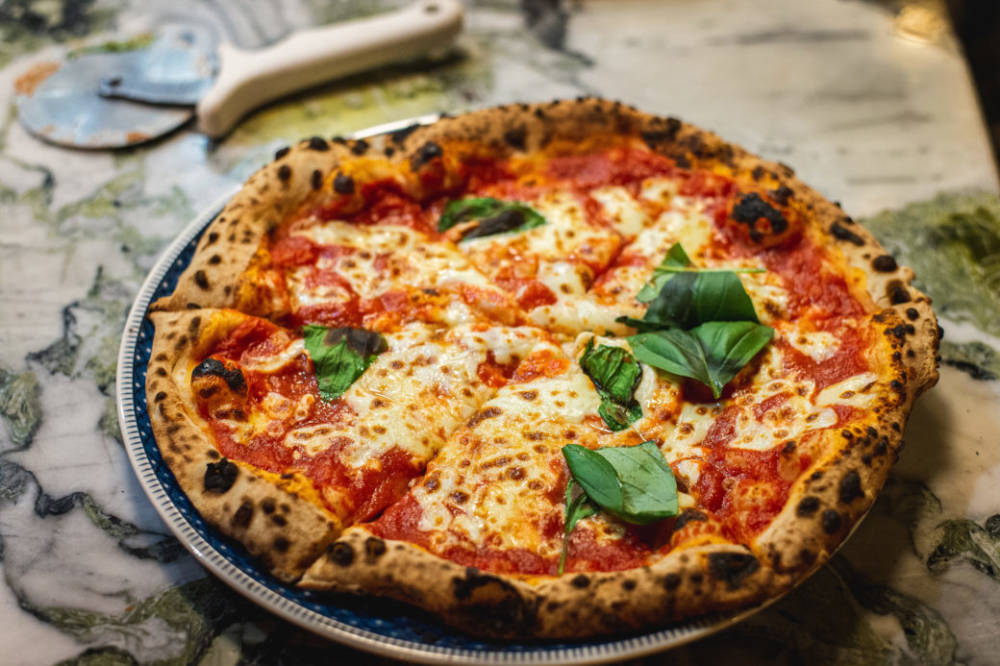 Pizza neapolitanischer Art in vier Sorten /©Unsplash/Aurélien Lemasson-Théobald