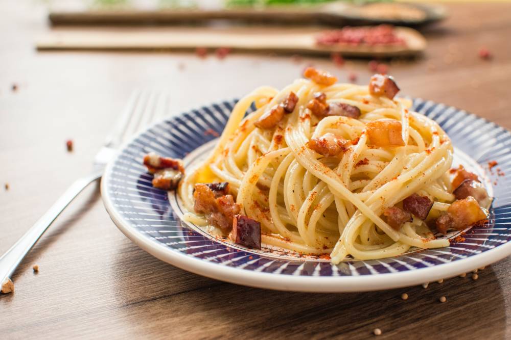 In diesem italienischen Restaurant in Poppenbüttel darf Spaghetti Carbonara nicht auf der Karte fehlen / ©Unsplash/Raphael Nogueira