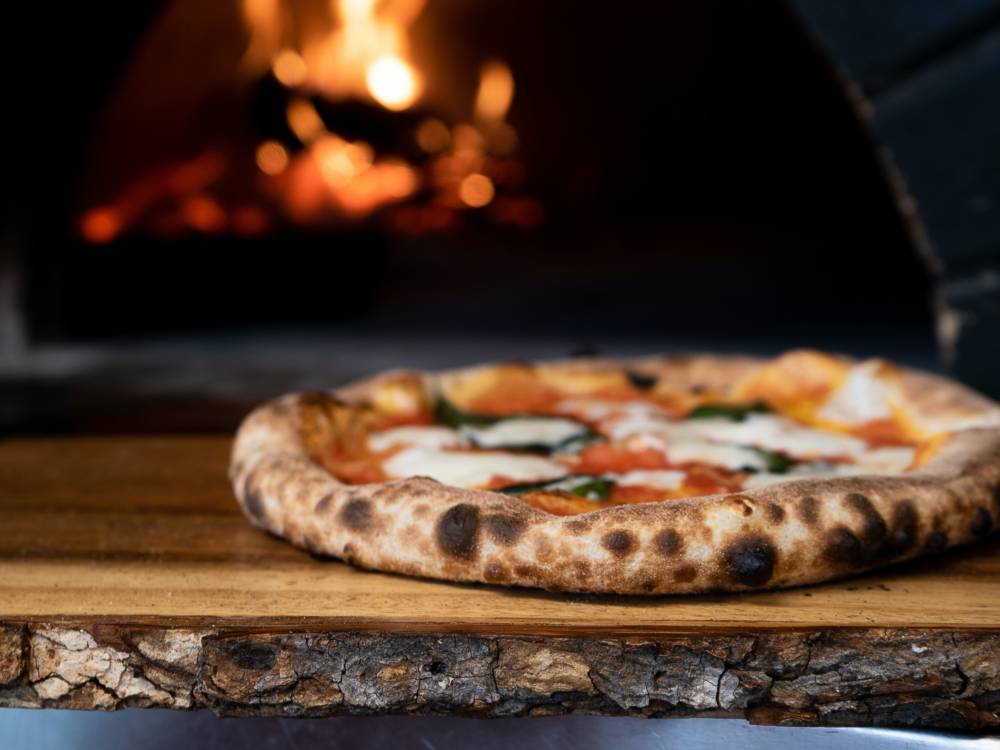 Bei der True Italian Pizza Week gibt’s Pizza und Aperol / ©Unsplash/Nik Owens