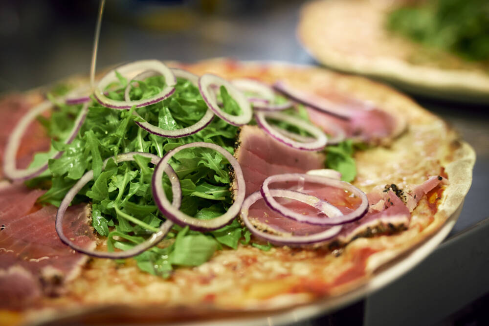 Pizza und basta! In der Pizzeria wird das italienische Gerichte zum Namensgeber / ©Marc Sill 