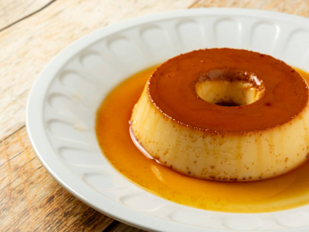 Süß, vollmundig und zergeht auf der Zunge: das traditionell portugiesische Dessert Pudim Flan /© Felippe Lopes/Unsplash